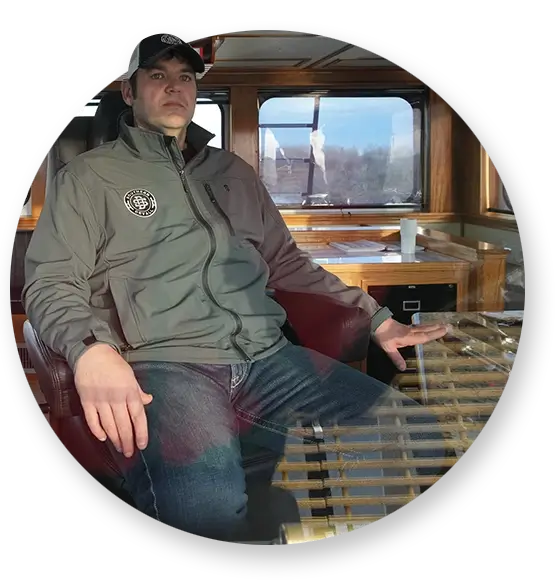 A Southern Devall crewman sitting in a captain's chair