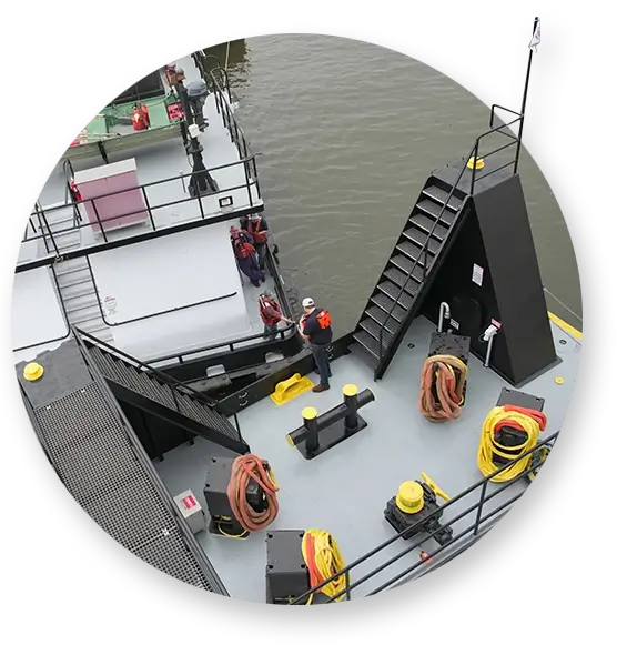 Southern Devall crewman tying off a barge to a dock