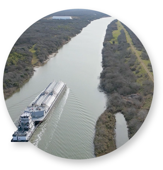 A Southern Devall Barge transporting liquid gas up a river